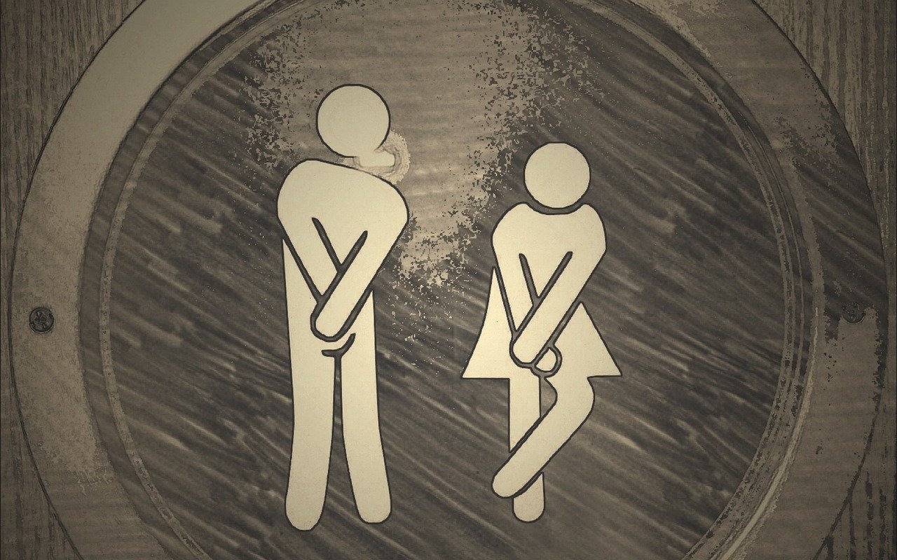 Ein Piktogramm für den Toilettengang von Mann und Frau.
