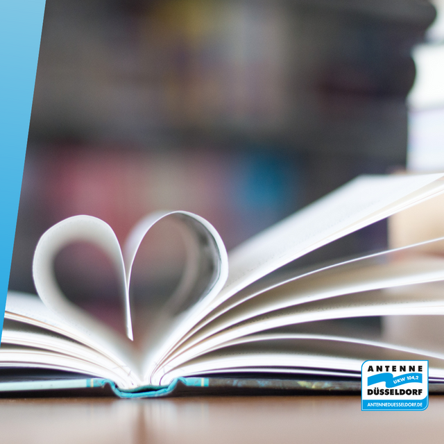 Ein aufgeschlagenes Buch. Die Seiten sind zu einem Herz geformt. An der Seite sieht man das Antenne-Düsseldorf-Logo.