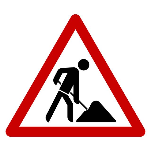 Ein Verkehrsschild weist auf eine Baustelle hin.