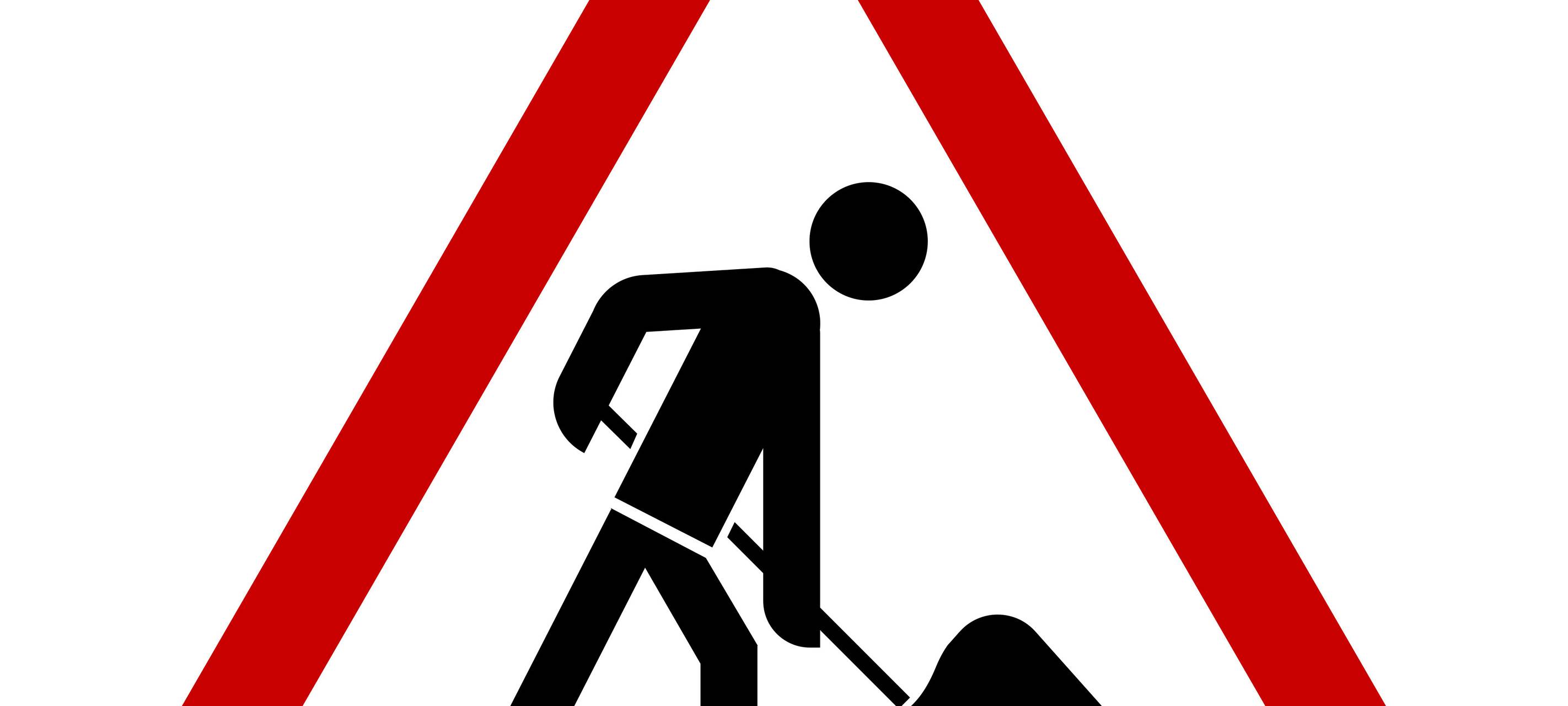 Ein Verkehrsschild weist auf eine Baustelle hin.