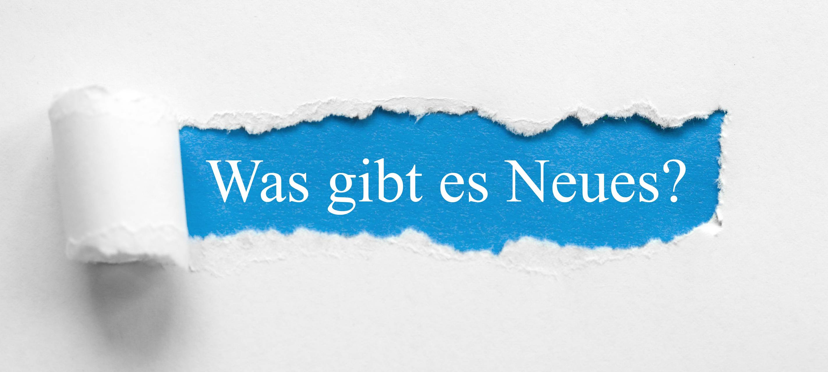 Was gibt es Neues? Also weißer Schriftzug auf blauem Hintergrund.